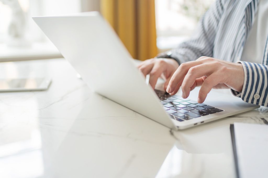 financier uses laptop works workplace in office